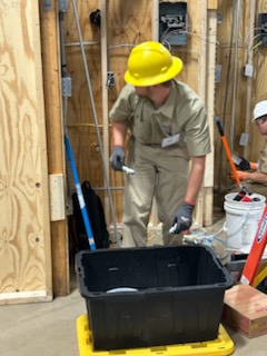 construction electrical student working in competition